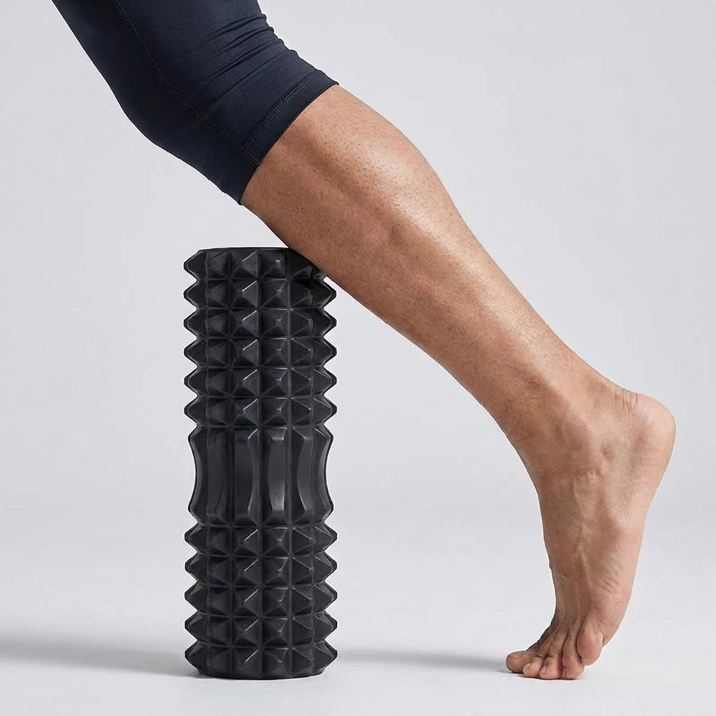 Foam roller being used on a calf muscle